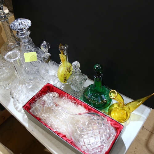 957 - A group of various cut-glass ware, to include 5 decanters, including Bohemian crystal, jar with plat... 