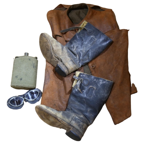 962 - An early 20th century gent's leather sleeveless jacket, a pair of boots, A/F, motorcycle glasses, an... 