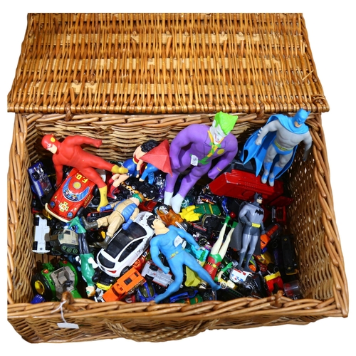 963 - Wicker hamper of various toy cars, action figures etc