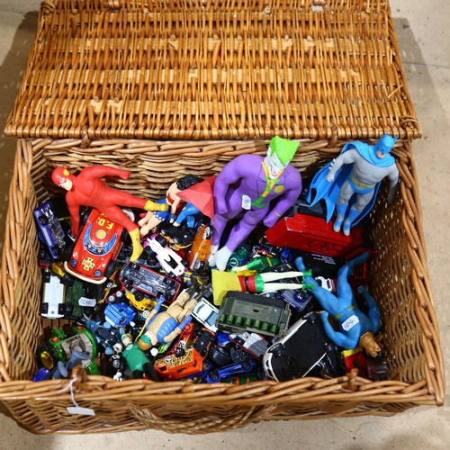 963 - Wicker hamper of various toy cars, action figures etc