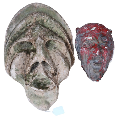 966 - A red painted plaster devil wall mask, and another (2)