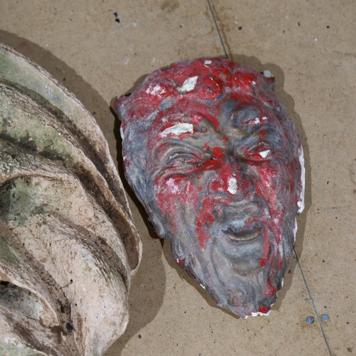 966 - A red painted plaster devil wall mask, and another (2)