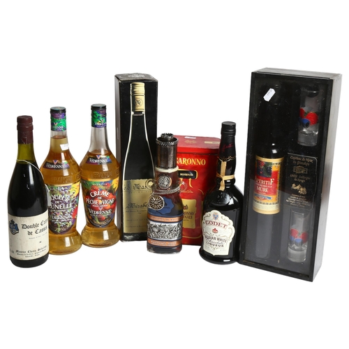 985 - A group of various alcohol, including a bottle of Belgian white chocolate liqueur, Disaronno, ouzo, ... 