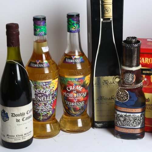 985 - A group of various alcohol, including a bottle of Belgian white chocolate liqueur, Disaronno, ouzo, ... 