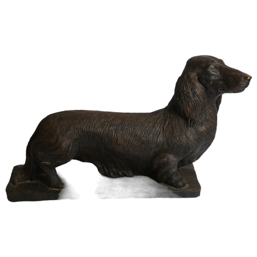 991 - Sandridge House Sculpture, a resin bronze study of a miniature long haired Dachshund, no. 6/500, by ... 