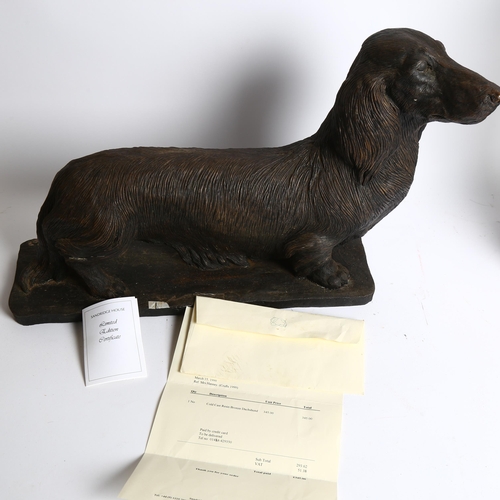 991 - Sandridge House Sculpture, a resin bronze study of a miniature long haired Dachshund, no. 6/500, by ... 