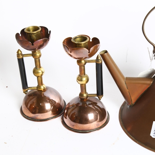 994 - A pair of Arts and Crafts trench art candlesticks, a copper kettle in the manner of Christopher Dres... 