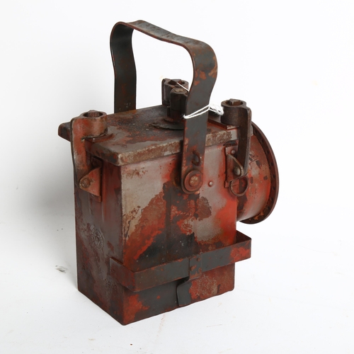 997 - A Second World War Period railway lantern, with partial paint residue, marked with H 1943, and impre... 