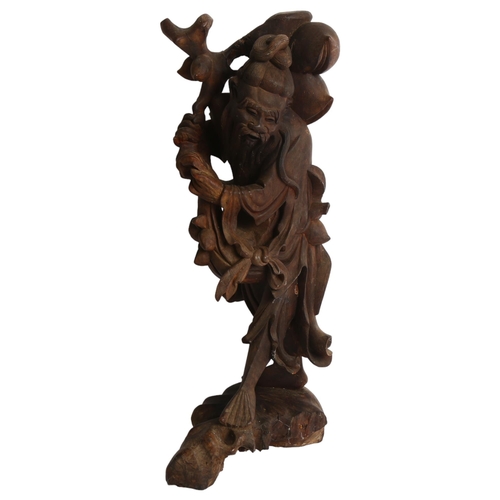 998 - A Chinese carved wood study of a sage, H50cm