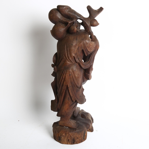 998 - A Chinese carved wood study of a sage, H50cm