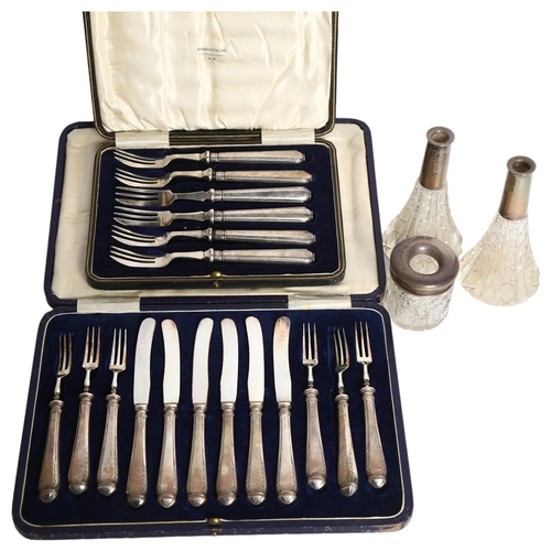 1100 - A cased set of 6 George V silver-handled tea knives and forks, hallmarks for Sheffield 1927, retaile... 