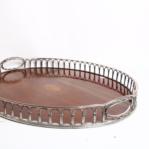 1121 - A large oak serving tray, with silver plate and copper gallery surround, 46cm x 59cm