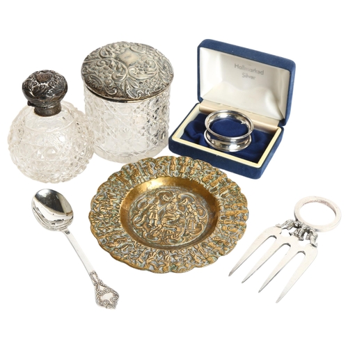 1122 - A silver-topped jar, scent bottle, cased silver napkin ring, spoon etc