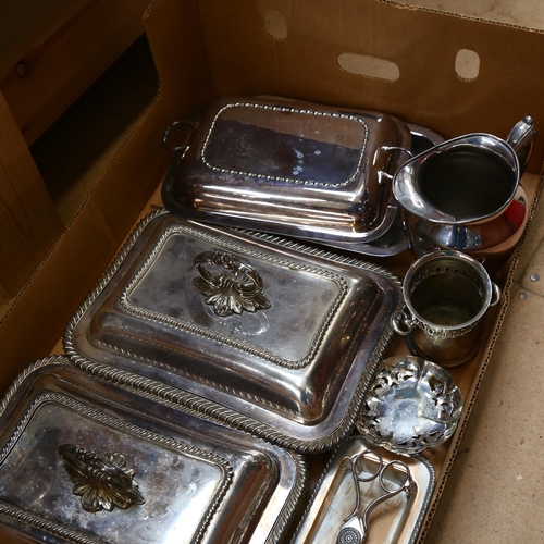 1130 - A quantity of silver plated items, including various tureens, a water jug, and candle snuffers etc