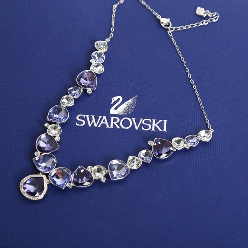 1152 - SWAROVSKI - a graduated gem set necklace, with teardrop pendant, boxed