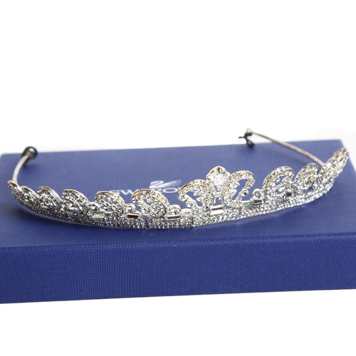 1154 - SWAROVSKI - a crystal set tiara (1 crystal loose)