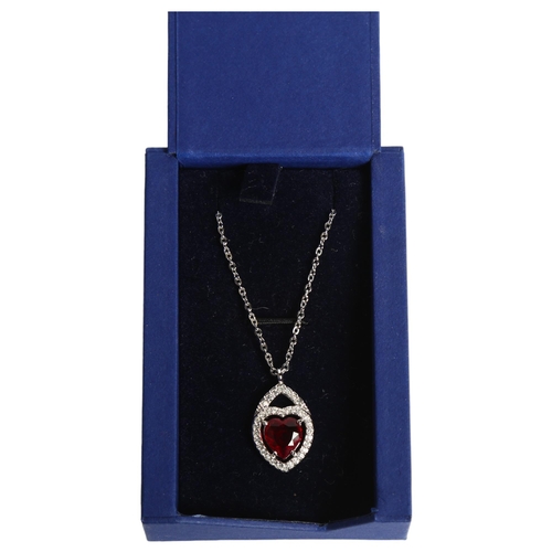 1155 - SWAROVSKI - a crystal and coloured gem set heart-shaped pendant and chain, boxed