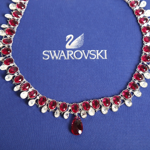 1156 - SWAROVSKI - a crystal and 2-coloured gem set necklace with drop pendant, boxed