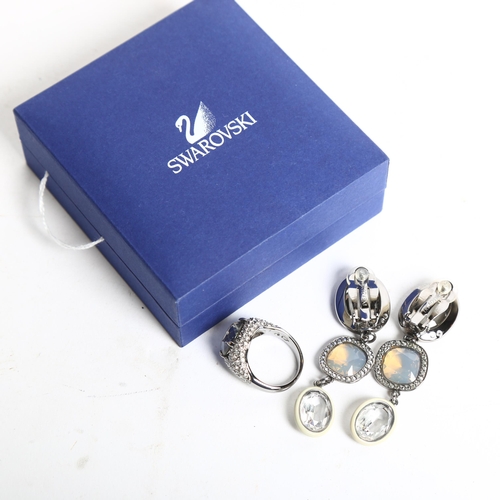 1159 - SWAROVSKI - a crystal set dress ring, and a pair of graduated crystal set clip-on pendant earrings