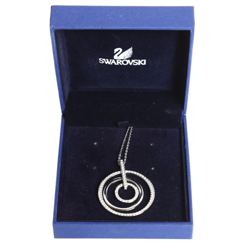 1160 - SWAROVSKI - a circular disc pendant and chain