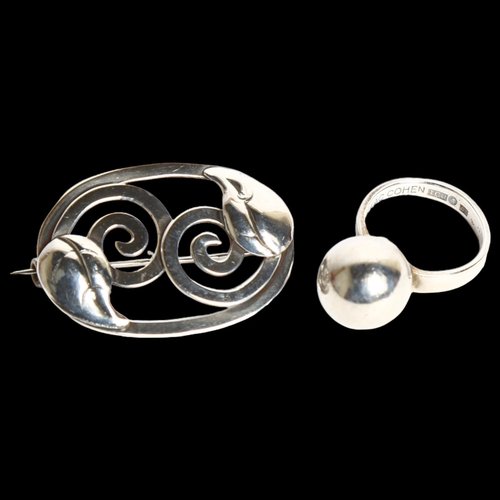 1194 - ISAAC COHEN - a stylised silver ring, and a stylised Danish silver brooch (2)