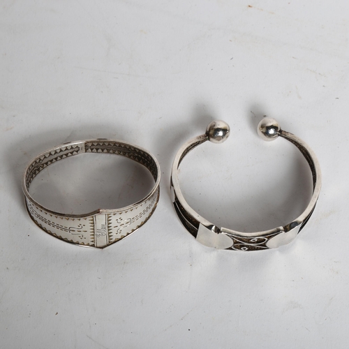 1195 - 2 Scandinavian white metal torque bangles