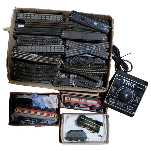 685 - Various model railway carriages, Trix power unit and track