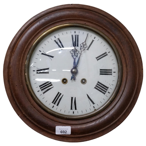 692 - An oak-cased dial wall clock, 8-day movement, painted dial, W37cm, complete with pendulum but no key