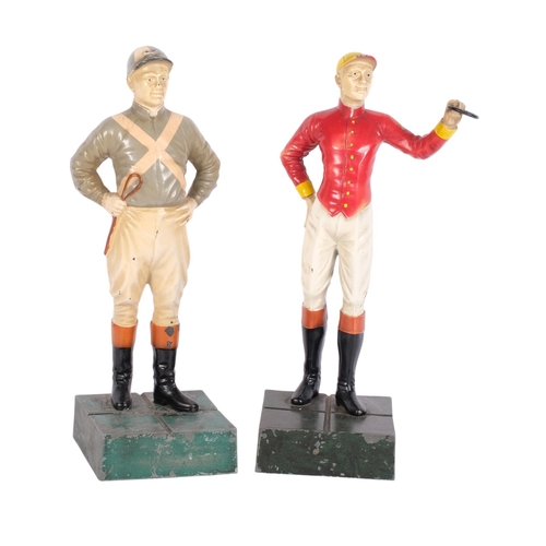 762 - 2 cold painted cast-metal figures, study of jockeys, on plinth bases, overall height 26cm