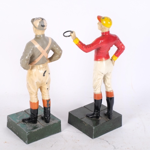 762 - 2 cold painted cast-metal figures, study of jockeys, on plinth bases, overall height 26cm