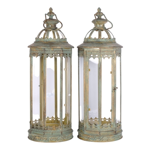 793 - A pair of octagonal verdigris metal candle lanterns, in Antique style, H55cm