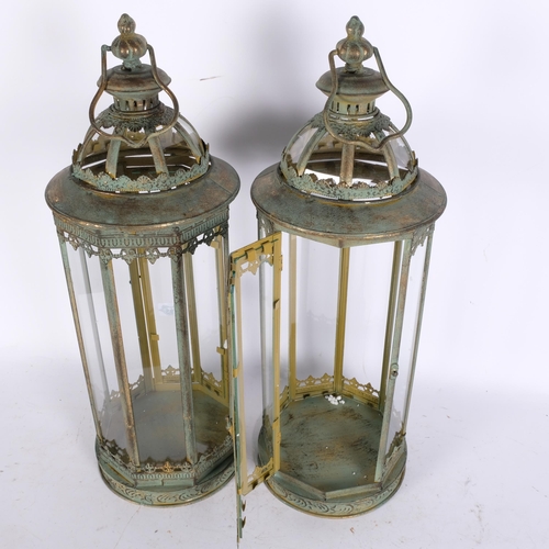 793 - A pair of octagonal verdigris metal candle lanterns, in Antique style, H55cm