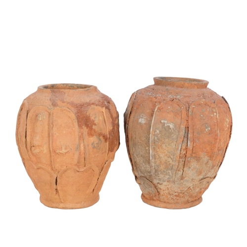 794 - 2 similar terracotta vases, with moulded figure panels, 21.5cm