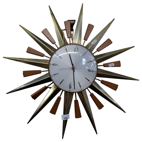 806 - A mid-century Metamec starburst clock, with quartz movement, W60cm, currently not in working order