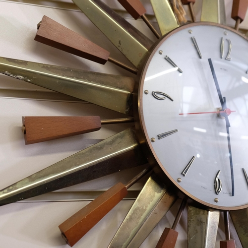 806 - A mid-century Metamec starburst clock, with quartz movement, W60cm, currently not in working order