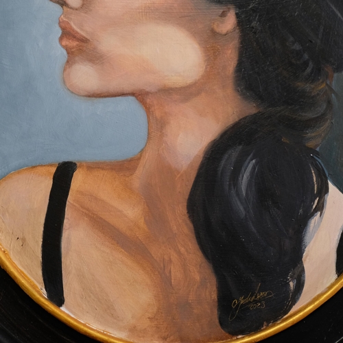 816 - CLIVE FREDRIKSSON - an oil on board, study of a girl in a black hat, oval frame, signed.