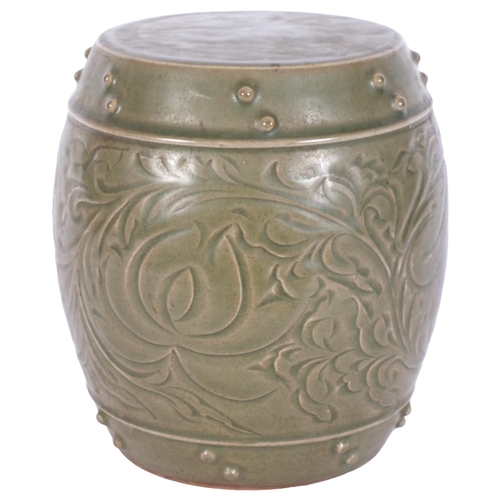 824 - Oriental incised and green glazed terracotta barrel design stand, H20cm