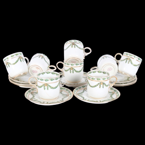 826 - A set of Victorian porcelain coffee cups and saucers, with swag decoration