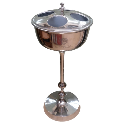 873 - A standing chromed metal 4-bottle stand, H85cm