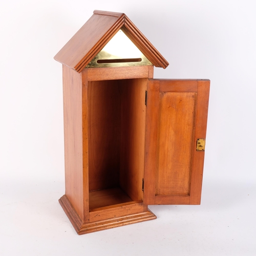 663 - A hardwood porch design mailbox with brass mount, H56cm