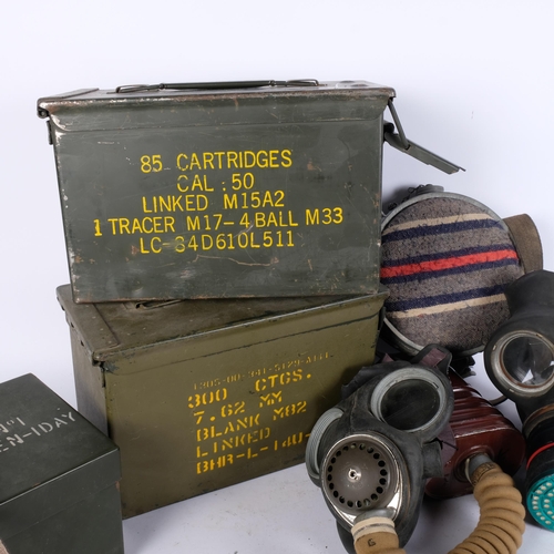 665 - 2 metal ammo boxes, and ration box, 2 Second World War gas masks, and a flask