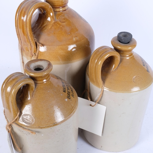 669 - 2 Makintosh Bros ginger beer flagons, and a larger flagon for W & C Slingsby, Coventry, 32cm