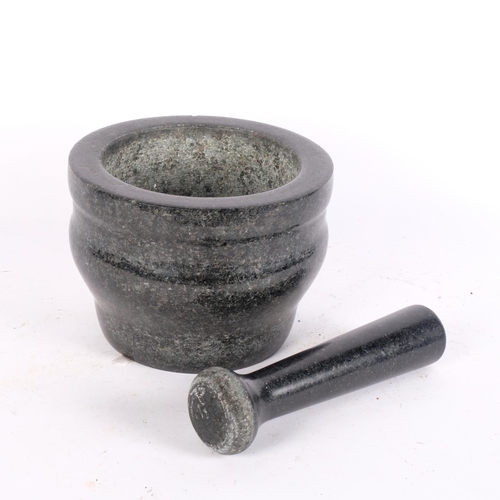 675 - A marble pestle and mortar, H13cm