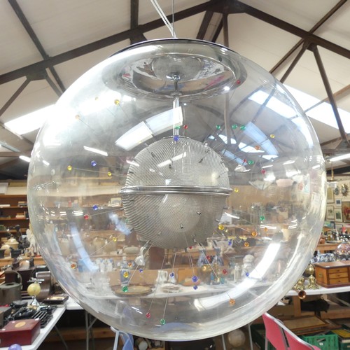 791 - An Italian contemporary pendant light fitting within a large globular glass dome. Overall diameter 3... 