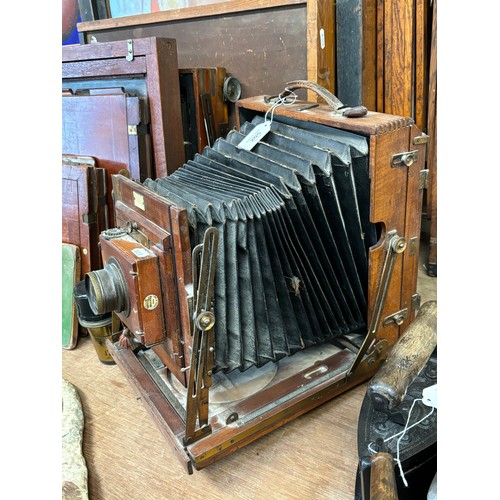 205 - An early 20th century Sands, Hunter & Company Ltd tail board square bellowed plate camera, mahogany ... 