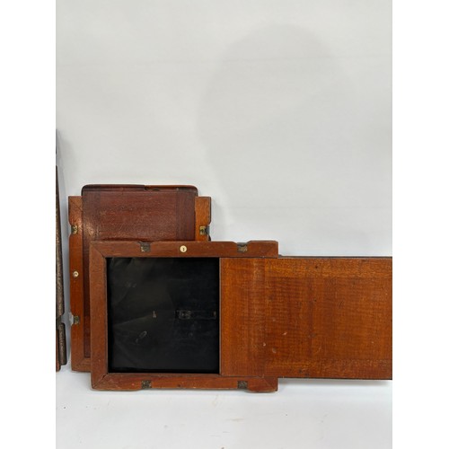 205 - An early 20th century Sands, Hunter & Company Ltd tail board square bellowed plate camera, mahogany ... 