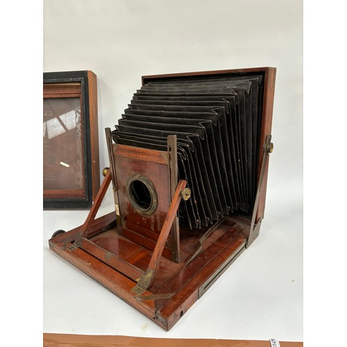 205 - An early 20th century Sands, Hunter & Company Ltd tail board square bellowed plate camera, mahogany ... 