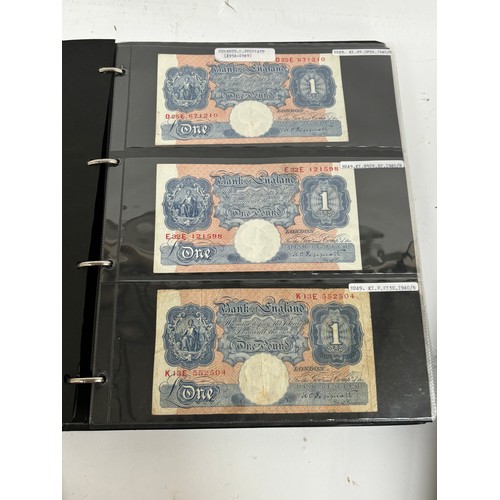 331 - An album of United Kingdom banknotes, including 2 white £5 notes, £1 notes from circa 1930, 1940, 19... 