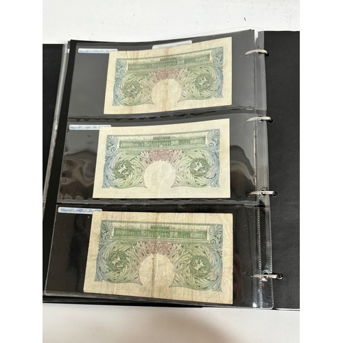 331 - An album of United Kingdom banknotes, including 2 white £5 notes, £1 notes from circa 1930, 1940, 19... 