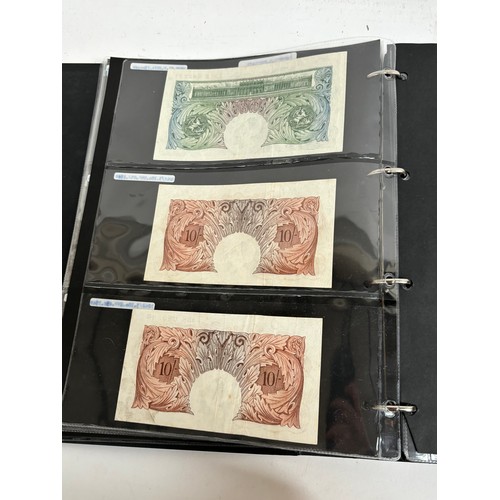 331 - An album of United Kingdom banknotes, including 2 white £5 notes, £1 notes from circa 1930, 1940, 19... 